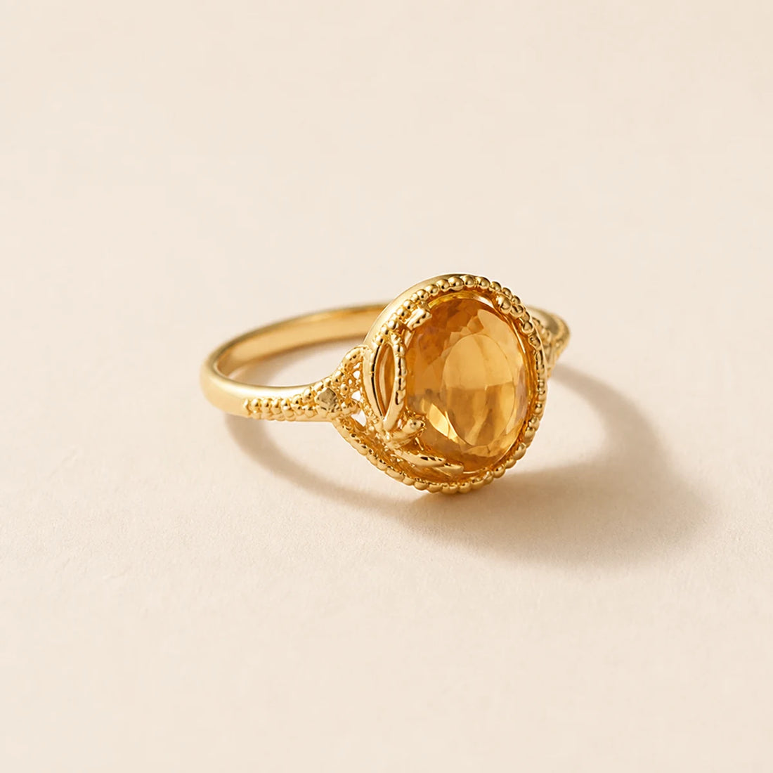 Bague en Citrine ovale avec monture en laiton doré