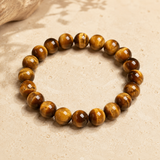 Bracelet Atlas en œil de tigre avec perles rondes aux reflets dorés