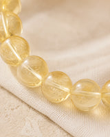 Détail des perles rondes de Citrine du bracelet