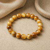 Bracelet en oeil de tigre jaune dans une ambiance premium et apaisante