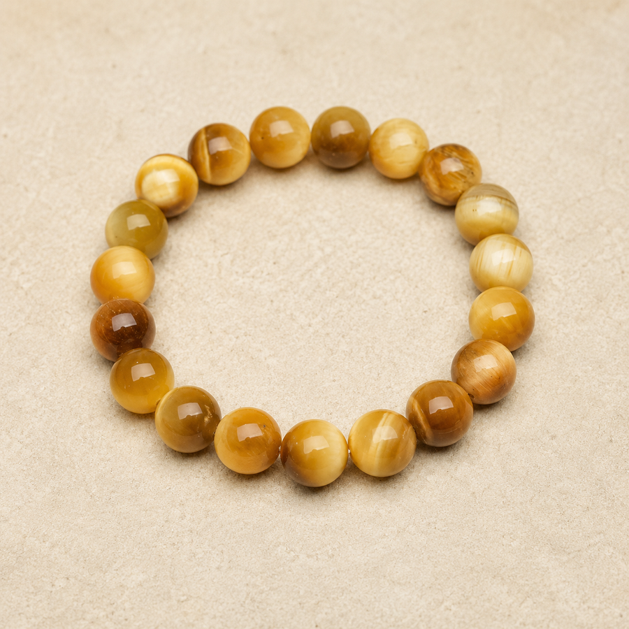 Bracelet Aelia en oeil de tigre aux reflets miel et dores