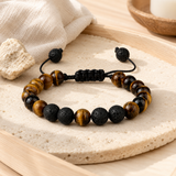 Bracelet œil de tigre et pierre de lave dans un univers rituel sobre