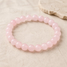 Bracelet en quartz rose naturel composé de perles rondes de 8 mm.
