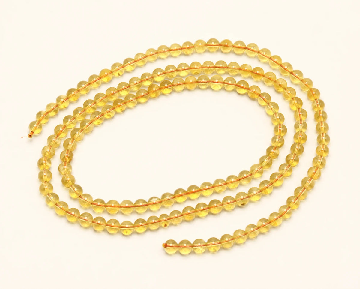 Fil de perles rondes en Citrine pour création de bijoux