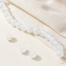 Perles rondes de pierre de lune blanche naturelle de 8 mm.